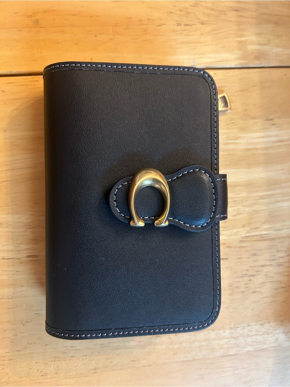 Coach Black Leather Wallet with Gold Horseshoe Buckle